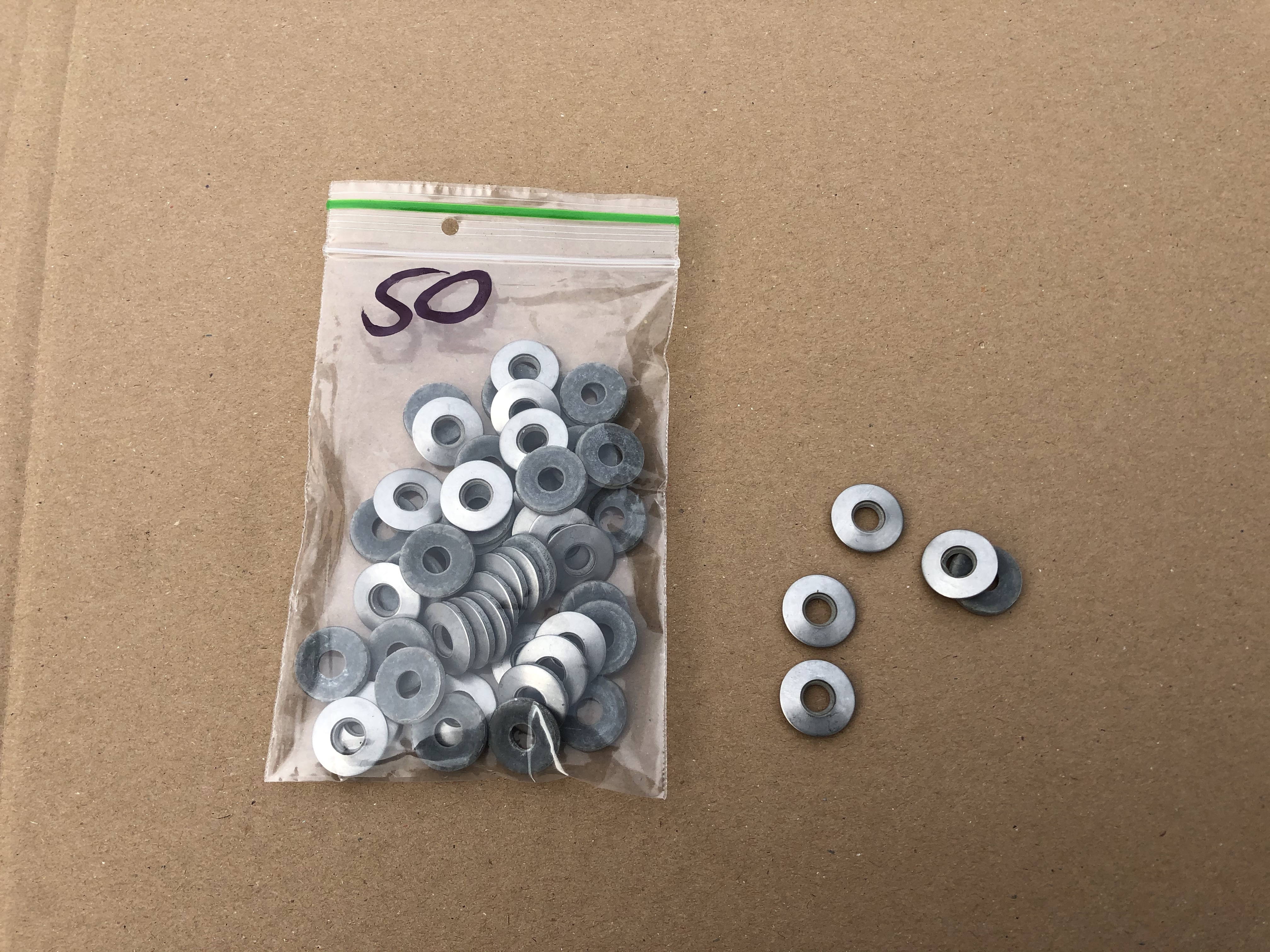 1540084A250  Sluitring M7X18, inox, 50pc